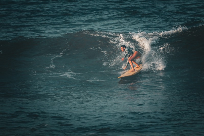 Alexandra surfing a wave in Brazil